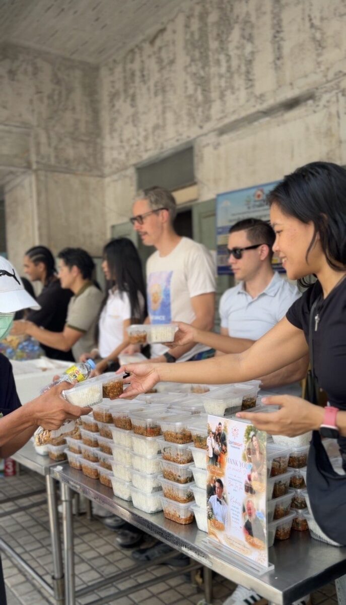 Our team handing out food boxes at Ban Im Jai