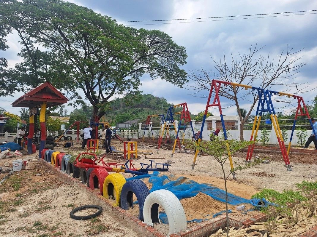 Children enjoying the new playground equipment