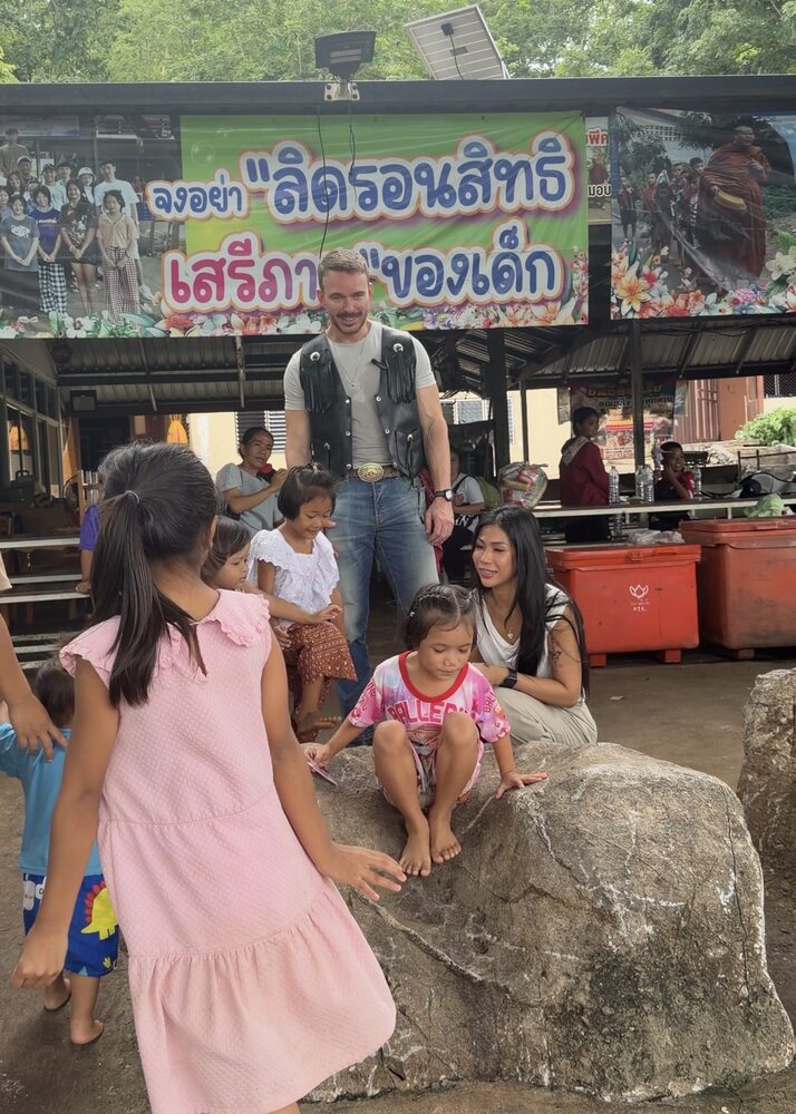 Sharing the afternoon and games with the children at Tham Charoen Suk